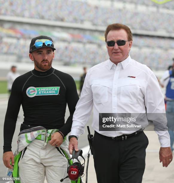 Ty Dillon, driver of the GEICO Military Chevrolet, talks with team owner, Richard Childress, during qualifying for the Monster Energy NASCAR Cup...