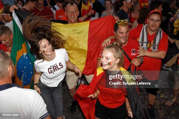 Belgian soccer fans celebrate winning of Belgium National team "Les Diables Rouges" during FIFA WC 2018 Belgium vs Brasil at Tournai Fan Zone on July...