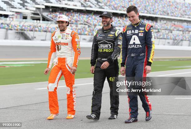 Chase Elliott, driver of the Hooters Chevrolet, Jimmie Johnson, driver of the Lowe's for Pros Chevrolet, and Alex Bowman, driver of the Axalta...