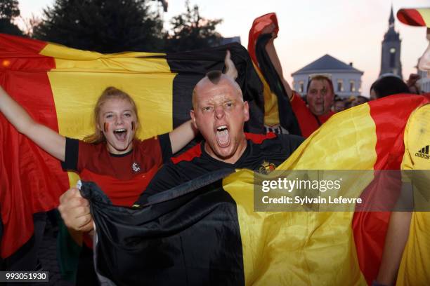 Belgian soccer fans celebrate winning of Belgium National team "Les Diables Rouges" during FIFA WC 2018 Belgium vs Brasil at Tournai Fan Zone on July...