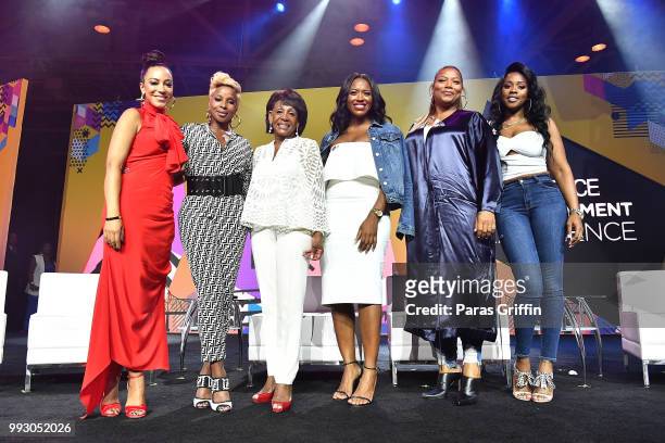Angela Rye, Mary J. Blige, Maxine Waters, Alencia Johnson, Queen Latifah and Remy Ma pose onstage during the 2018 Essence Festival presented by...