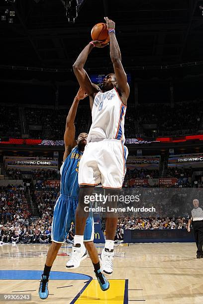 Serge Ibaka of the Oklahoma City Thunder takes a shot against the New Orleans Hornets during the game at Ford Center on March 10, 2010 in Oklahoma...