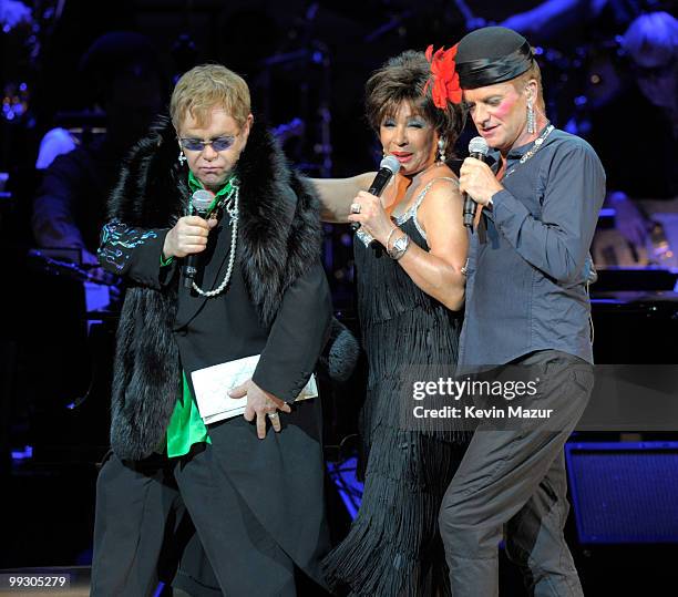 Elton John, Dame Shirley Bassey and Sting perform on stage during the Almay concert to celebrate the Rainforest Fund's 21st birthday at Carnegie Hall...