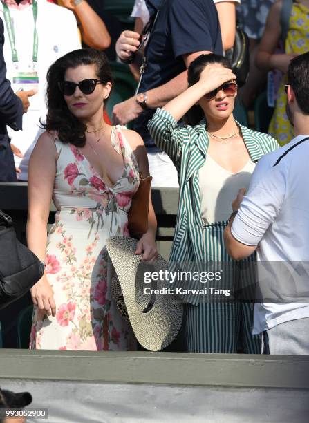 Cara McConnell and Olivia Munn attend day five of the Wimbledon Tennis Championships at the All England Lawn Tennis and Croquet Club on July 6, 2018...