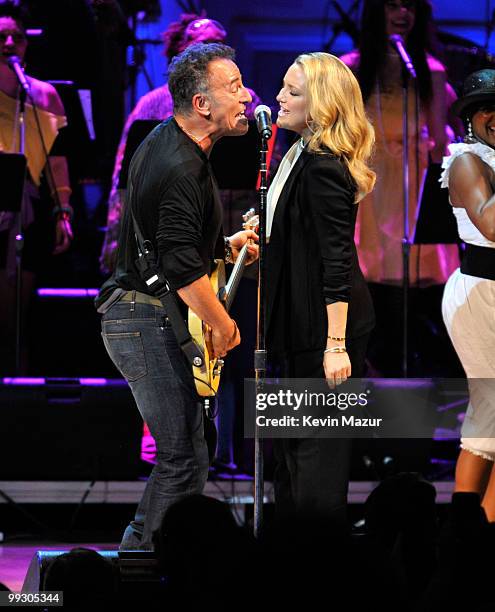 Bruce Springsteen and Kate Hudson perform on stage during the Almay concert to celebrate the Rainforest Fund's 21st birthday at Carnegie Hall on May...