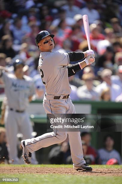 Cody Ross of the Florida Marlins takes a swing during a baseball game against the Washington Nationals on May 9, 2010 at Nationals Park in...