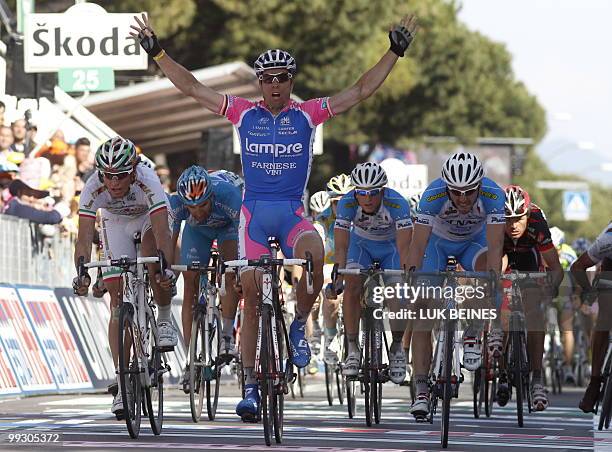 Germany's Danilo Hondo crosses the finish line to take the third place of the sixth stage of the 93rd Giro d'Italia going from Fidenza to Marina di...
