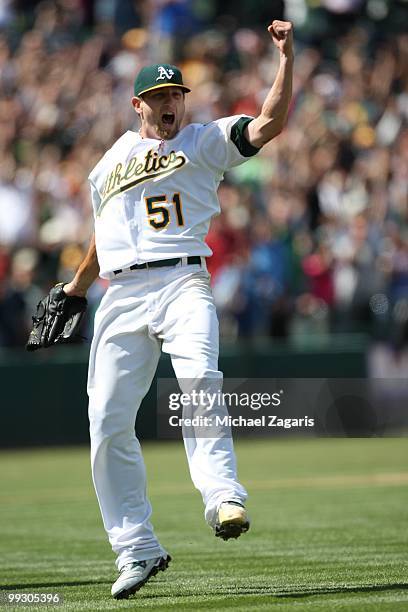 Dallas Braden of the Oakland Athletics pumping his fist in the air after pitching a perfect game against the Tampa Bay Rays at the Oakland Coliseum...