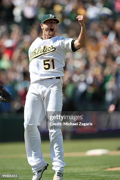 Dallas Braden of the Oakland Athletics pumping his fist in the air after pitching a perfect game against the Tampa Bay Rays at the Oakland Coliseum...