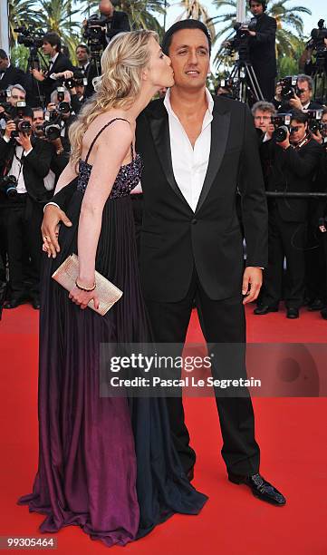 Singer Dany Brillant with Nathalie Moury attend the "Wall Street: Money Never Sleeps" Premiere at the Palais des Festivals during the 63rd Annual...