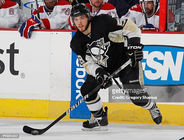 Kris Letang of the Pittsburgh Penguins looks to pass against the Montreal Canadiens in Game Seven of the Eastern Conference Semifinals during the...
