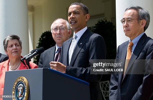 President Barack Obama speaks alongside members of his administration, including Secretary of Homeland Security Janet Napolitano , Interior Secretary...