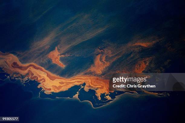 Oil from the Deepwater Horizon wellhead collects on top of the water off the coast of Louisiana on May 6, 2010. The well is still leaking an...