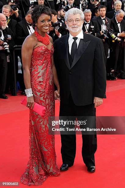 Mellody Hobson and writer/director George Lucas attend the Premiere of 'Wall Street: Money Never Sleeps' held at the Palais des Festivals during the...