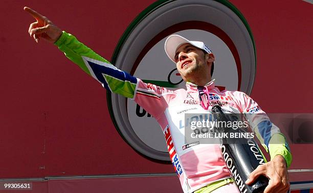 Italian Vincenzo Nibali of Liquigas celebrates retaining the pink jersey of leader on the podium of the sixth stage of the 93rd Giro d'Italia going...