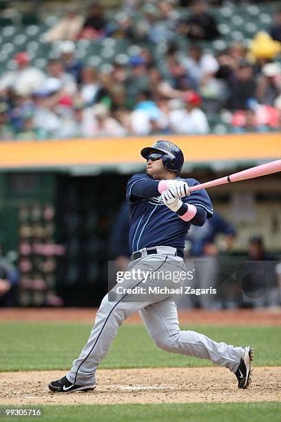 Dioner Navarro of the Tampa Bay Rays hitting during the game against the Oakland Athletics at the Oakland Coliseum on May 9, 2010 in Oakland,...