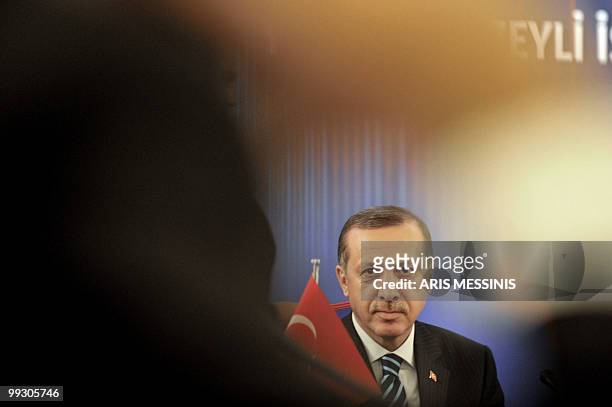 Turkish prime minister Recep Tayyip Erdogan looks on after signing an agreement in Athens with Greek counterpart George Papandreou on May 14, 2010....
