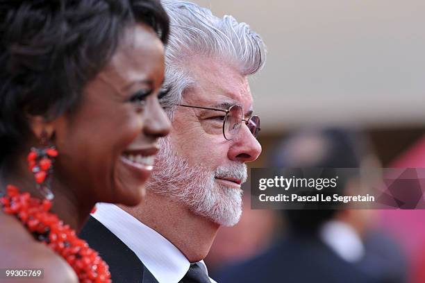 Director/producer George Lucas and wife Mellody Hobson attend the "Wall Street: Money Never Sleeps" Premiere at the Palais des Festivals during the...