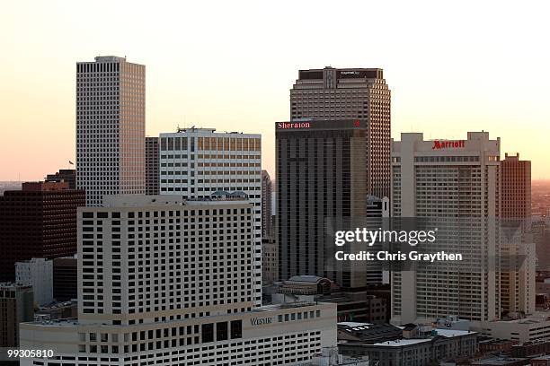 The sun sets on the skyline of downtown New Orleans, Louisiana on April 10, 2010.