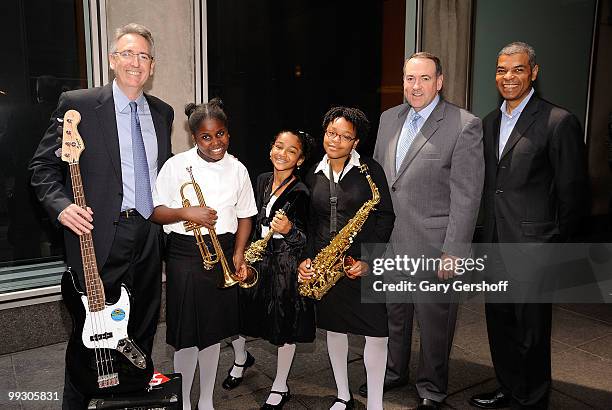 President & CEO, NAMM, Joe Lamond, students Afeifha Thomas, Amber Colquhoun and Jazmine Williams, T.V. News personality Mike Huckabee, and Executive...