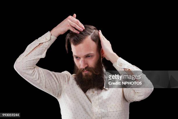 portrait of an hipster man with beard - hair part imagens e fotografias de stock