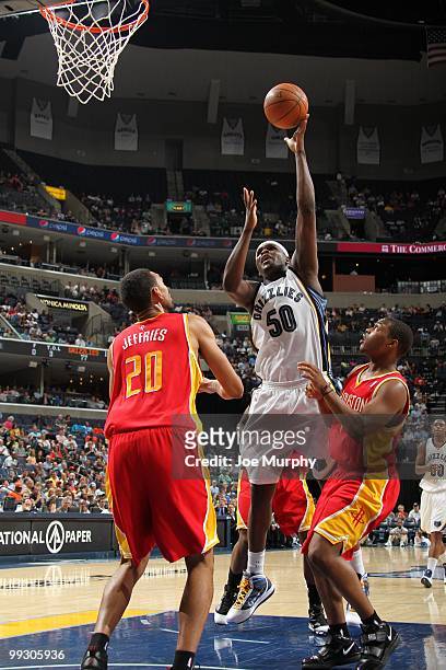 Zach Randolph of the Memphis Grizzlies puts a shot up against the Houston Rockets during the game at the FedExForum on April 6, 2010 in Memphis,...