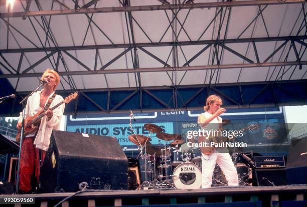 Sting, Stewart Copeland and Andy Summers of the Police performs on stage at Comiskey Park in Chicago, Illinois, July 23, 1984.