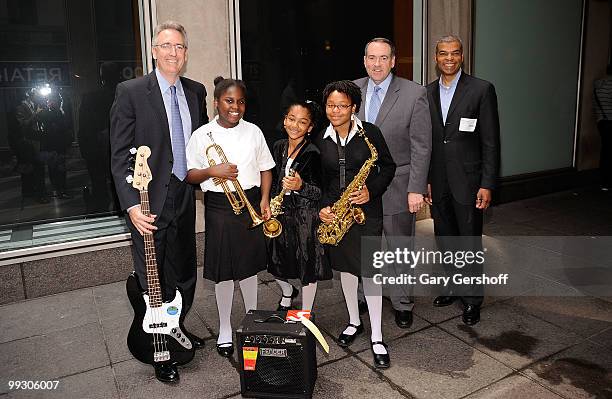 President & CEO, NAMM, Joe Lamond, students Afeifha Thomas, Amber Colquhoun and Jazmine Williams, T.V. News personality Mike Huckabee, and Executive...