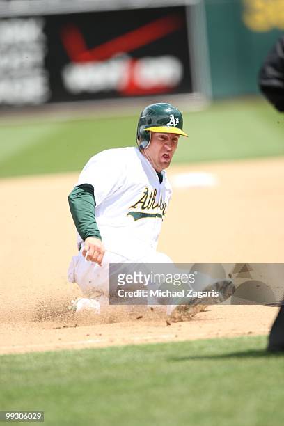 Cliff Pennington of the Oakland Athletics sliding into third during the game against the Tampa Bay Rays at the Oakland Coliseum on May 9, 2010 in...
