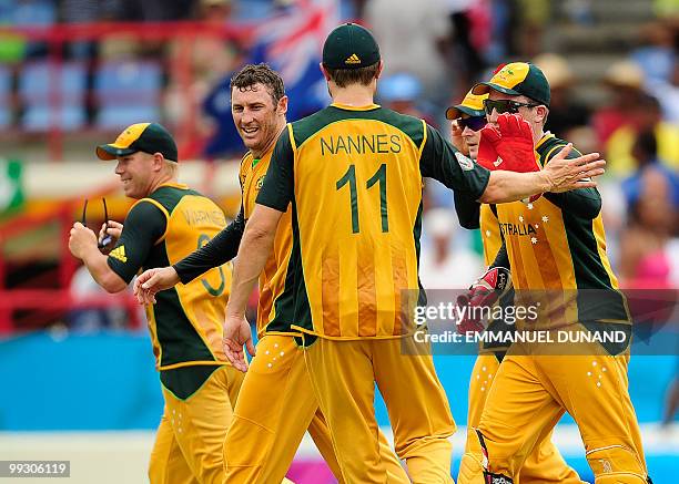 Australian players celebrate after taking the wicket of Pakistani captain Shahid Afridi during the ICC World Twenty20 second semifinal match between...