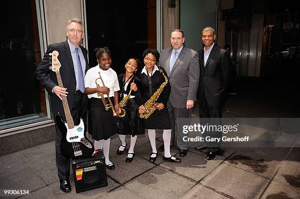 President & CEO, NAMM, Joe Lamond, students Afeifha Thomas, Amber Colquhoun and Jazmine Williams, T.V. News personality Mike Huckabee, and Executive...