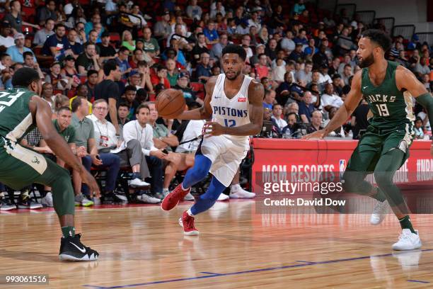 Larry Drew II of the Detroit Pistons handles the ball against the Milwaukee Bucks during the 2018 Las Vegas Summer League on July 6, 2018 at the Cox...