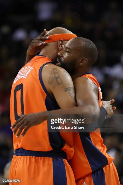Baron Davis and Drew Gooden of 3's Company celebrate their win over Trilogy during week three of the BIG3 three on three basketball league game at...