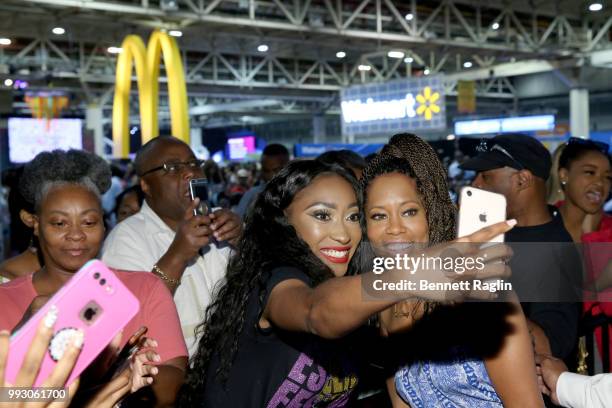 Regina King takes a selfie with a fan at 'If Beale Street Could Talk' Movie Cast and Filmmakers at Essence Festival 2018 on July 6, 2018 in New...