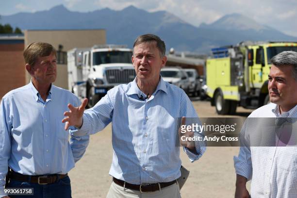 Colorado Governor John Hickenlooper, center, discusses the Spring Fire during a press conference on the Sierra Grande School grounds along with U.S....