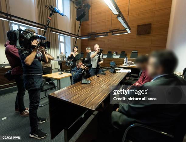 The accused, Hussein K. , sitting next to his interpreter in a courtroom of the District Court in Freiburg, Germany, 07 November 2017. The murder...