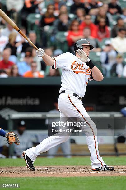 Matt Wieters of the Baltimore Orioles bats against the Seattle Mariners at Camden Yards on May 13, 2010 in Baltimore, Maryland.