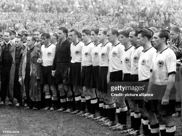 - An archive picture, dated 4 July 1954, shows the German national soccer team being honored in front of 53,000 espectators after their victory of...