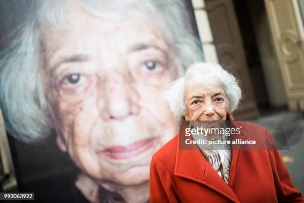 Margot Friedlander, a survivor of the Nazi persecution, stands in front of her portrait by artist Luigi Toscano in Berlin, Germany, 7 November 2017....