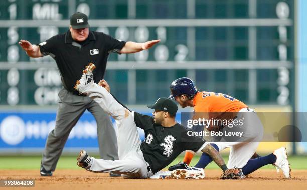 Josh Reddick of the Houston Astros steals second base as Leury Garcia of the Chicago White Sox is late with the tag at Minute Maid Park on July 6,...