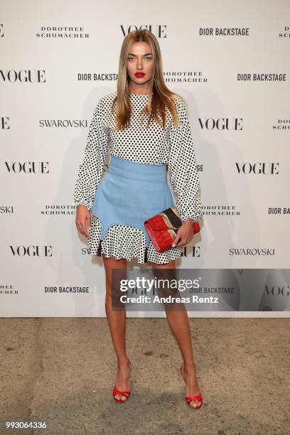 Alina Baikova attends the VOGUE Fashion Party at Kunstareal am Weissensee on July 6, 2018 in Berlin, Germany.