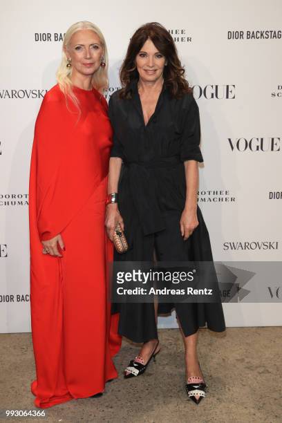 Christiane Arp and Iris Berben attend the VOGUE Fashion Party at Kunstareal am Weissensee on July 6, 2018 in Berlin, Germany.
