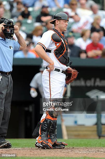 Matt Wieters of the Baltimore Orioles rests during a break in the game against the Seattle Mariners at Camden Yards on May 13, 2010 in Baltimore,...