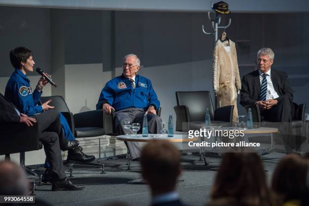 Astronaut Samantha Cristoforetti , Apoloo 16 astronaut Charles 'Charlie' Duke and ESA coordinator Thomas Reiter participate in a discussion round at...