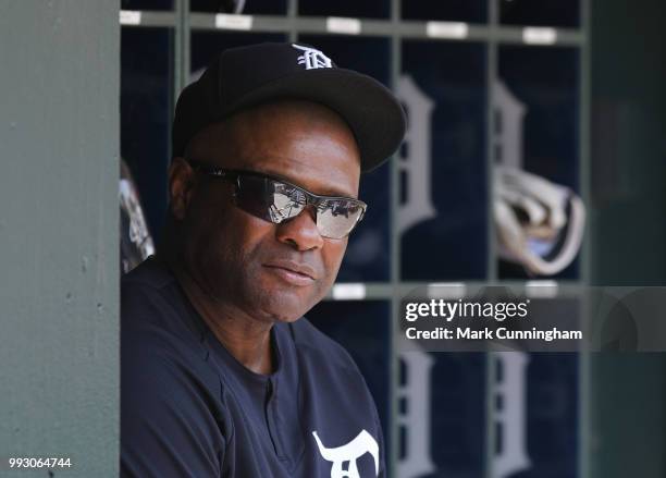 Hitting coach Lloyd McClendon of the Detroit Tigers looks on from the dugout during the game against the Cleveland Indians at Comerica Park on May...