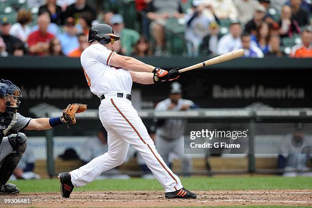 Luke Scott of the Baltimore Orioles bats against the Seattle Mariners at Camden Yards on May 13, 2010 in Baltimore, Maryland.