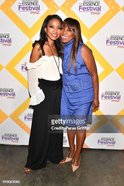 Marshawn Evans Daniels and Michelle Miller attend the 2018 Essence Festival presented by Coca-Cola at Ernest N. Morial Convention Center on July 6,...