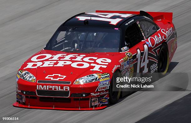 Tony Stewart drives the Office Depot Chevrolet during practice for the NASCAR Sprint Cup Series Autism Speaks 400 at Dover International Speedway on...