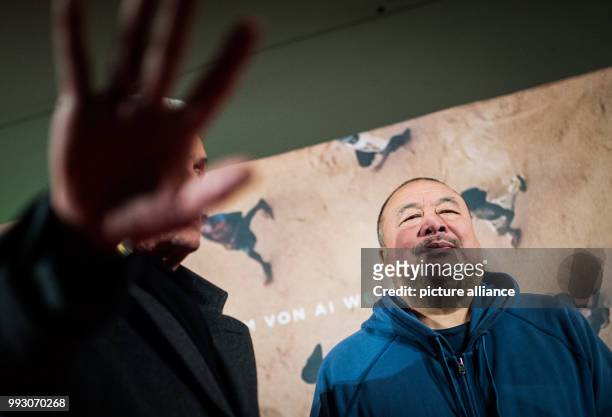 Chinese artist Ai Weiwei arrives at the Germany premiere of his movie 'Human Flow' in Berlin, Germany, 7 November 2017. The movie can be seen in...