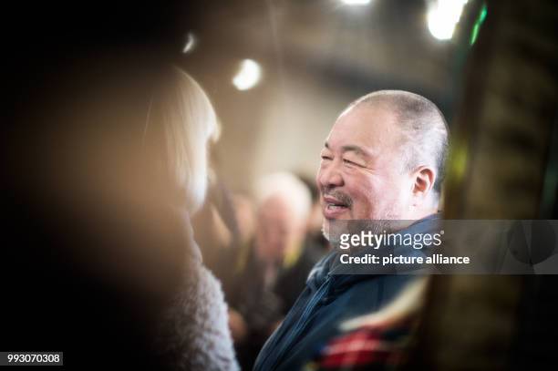 Chinese artist Ai Weiwei arrives at the Germany premiere of his movie 'Human Flow' in Berlin, Germany, 7 November 2017. The movie can be seen in...
